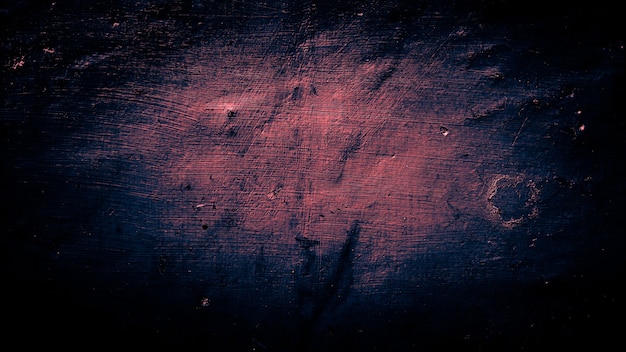 dunkler Grunge-Hintergrund aus beunruhigtem altem Mauerbeton
