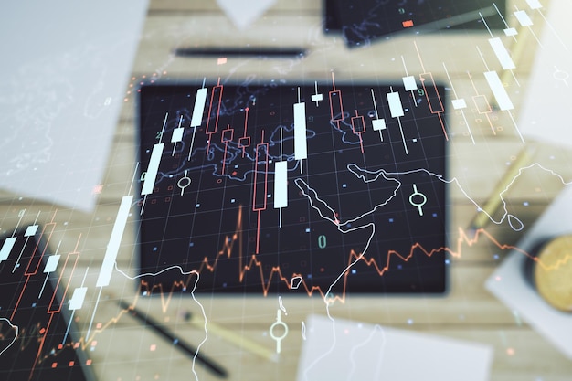 Dupla exposição do diagrama financeiro criativo abstrato com mapa-múndi e tablet digital moderno no conceito bancário e contábil de fundo