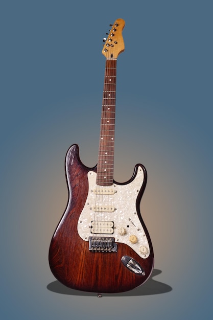 E-Gitarre mit Schatten auf blauem Hintergrund
