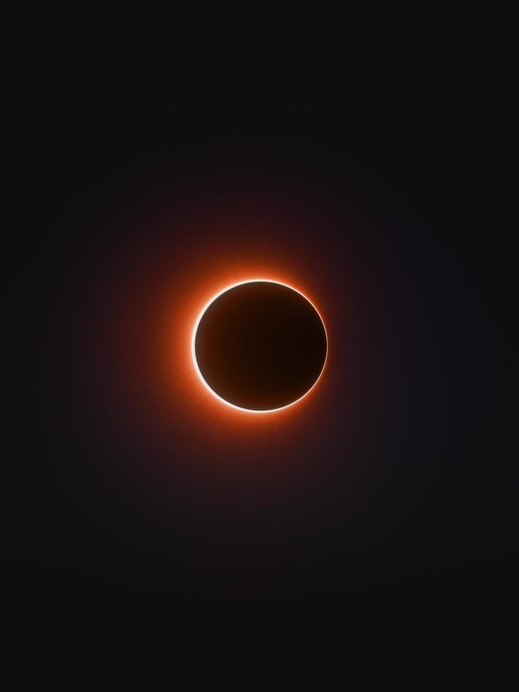 Foto eclipse solar total en rojo alineación del sol tierra y luna en un cielo oscuro