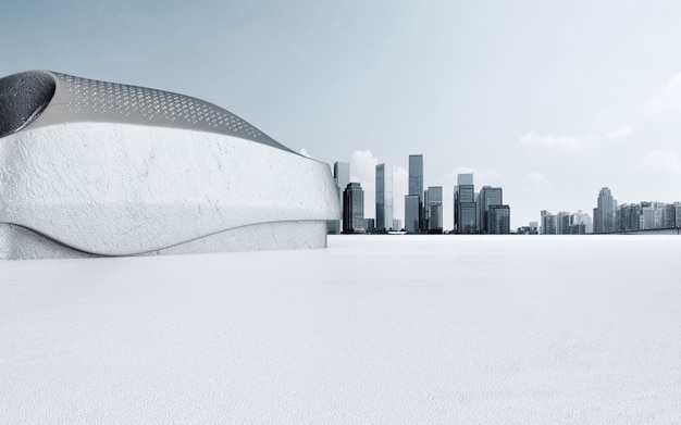 Edifício moderno e piso vazio com horizonte