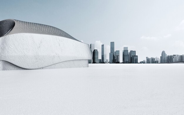 Edificio moderno y piso vacío con horizonte.