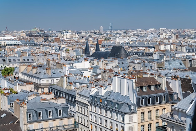 Foto edifícios e telhados típicos de paris