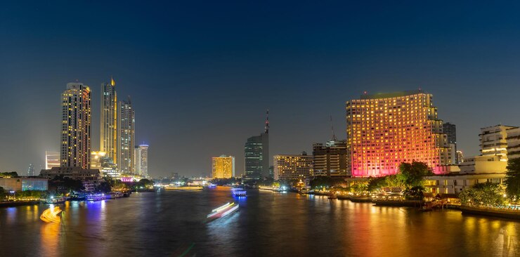 Foto edifícios iluminados na cidade à noite