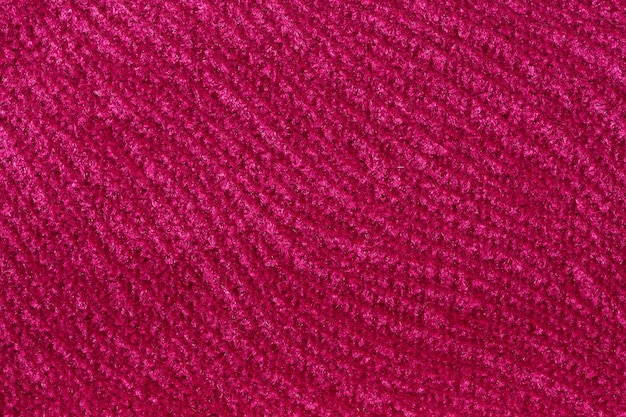 Efectivo fondo textil en tono rosa brillante