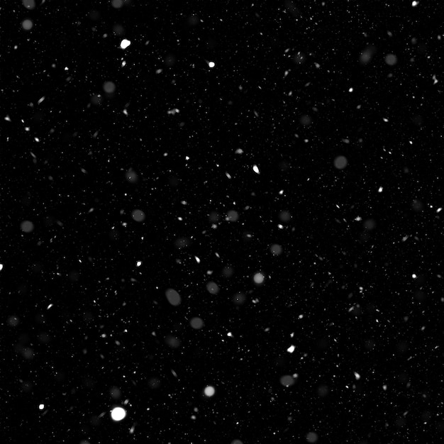 Efecto de textura de nieve blanca natural aislado sobre fondo de noche negra