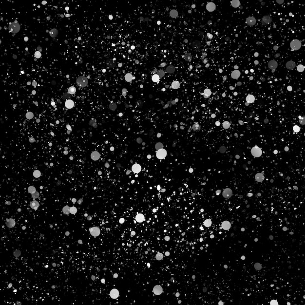 Efecto de textura de nieve blanca natural aislado sobre fondo de noche negra