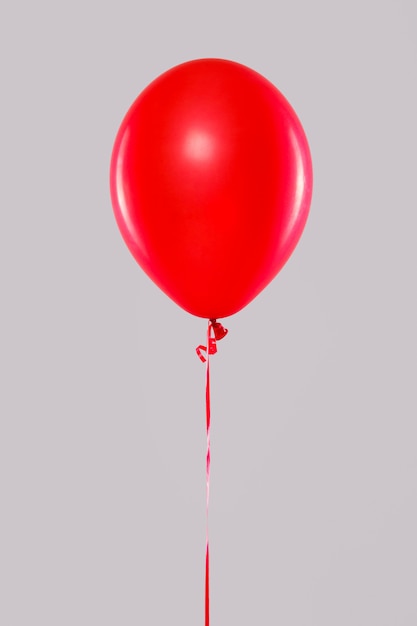 Foto ein ballon isoliert auf grau