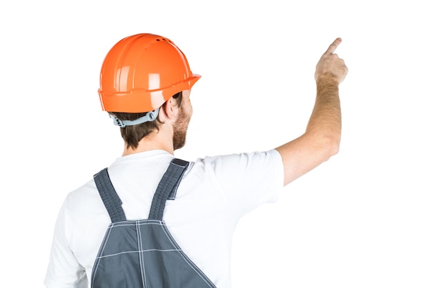 Ein Baumann steht mit dem Rücken und zeigt seine Hand Reparatur und Konstruktion isoliert über weißem Hintergrund