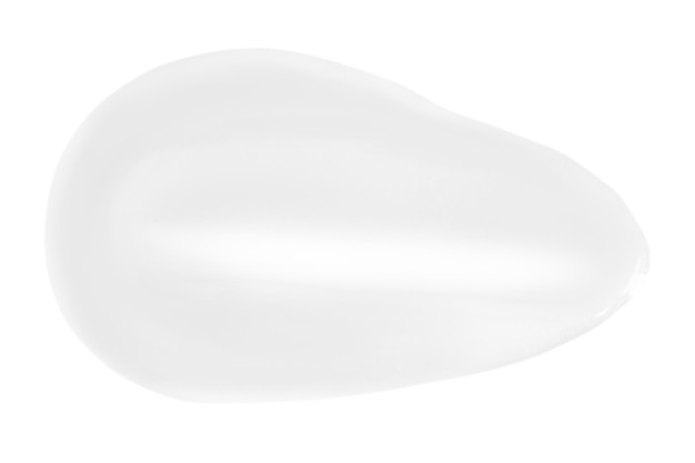 Ein Fleck fettiger Creme auf weißem Hintergrund