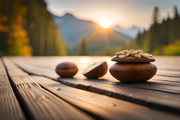 ein Holztisch mit Nüssen und Bergen im Hintergrund