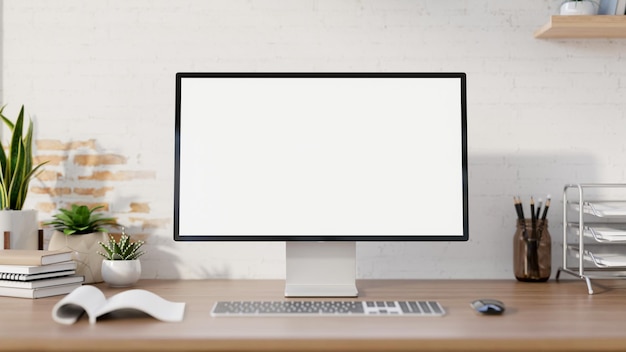 Ein minimalistischer Büro-Schreibtisch eines Bauernhauses, ein Computer-Mockup auf einem Holzschreibtisch gegen die weiße Ziegelsteinmauer