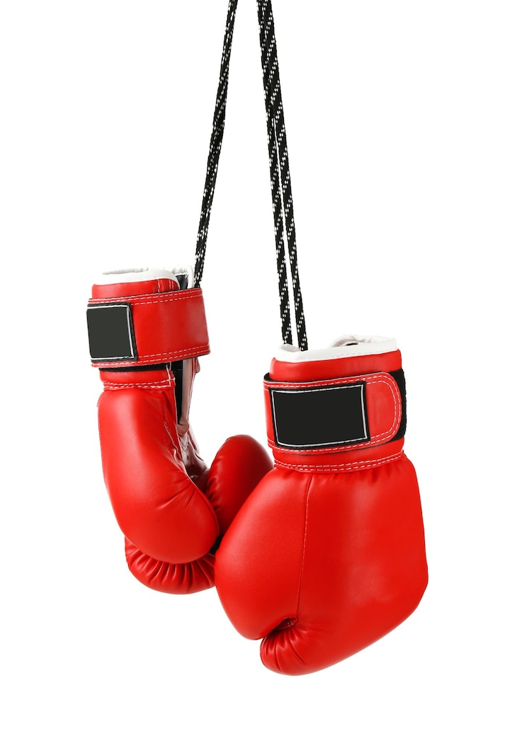 Foto ein paar rote boxhandschuhe, isoliert auf weiß
