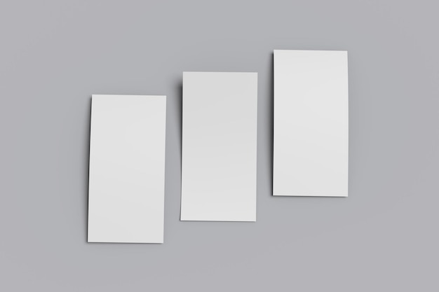 ein quadratisches Stück Papier steht auf einem grauen Hintergrund