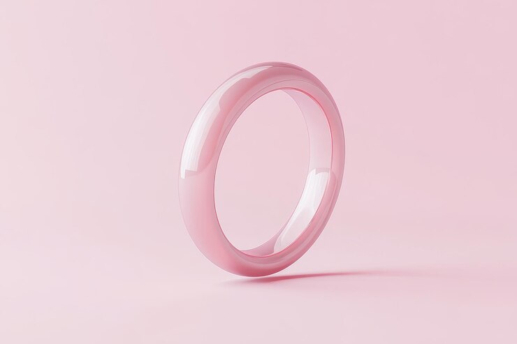 Foto ein rosa glasring auf einem rosa hintergrund