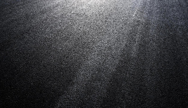 Ein schwarzer Hintergrund mit einem Licht darauf