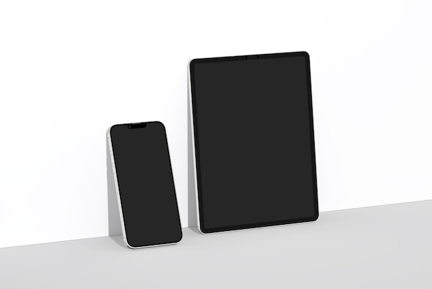Ein schwarzes Tablet und ein schwarzes Tablet liegen nebeneinander.