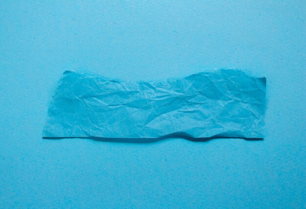 Ein Stück Papier mit blauem Hintergrund, auf dem steht: „Ich bin kein Papier“.