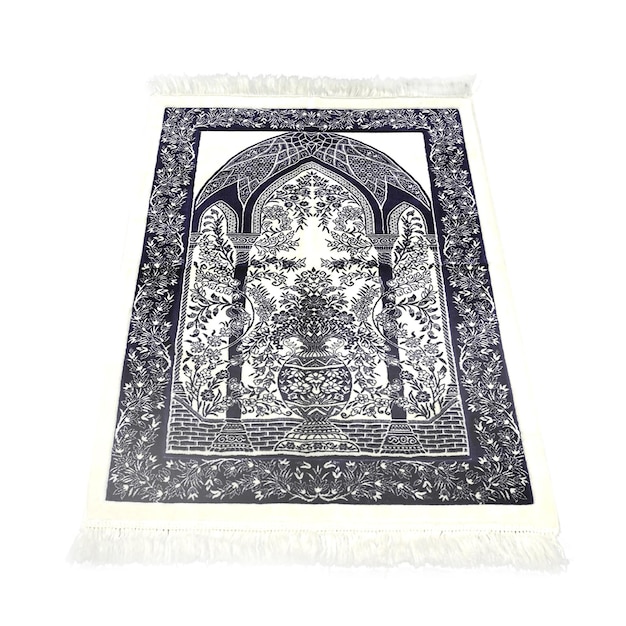Ein Teppich mit dem Motiv einer Moschee darauf