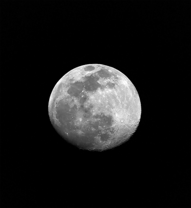 Foto ein vollmond an einem dunklen himmel mit schwarzem hintergrund