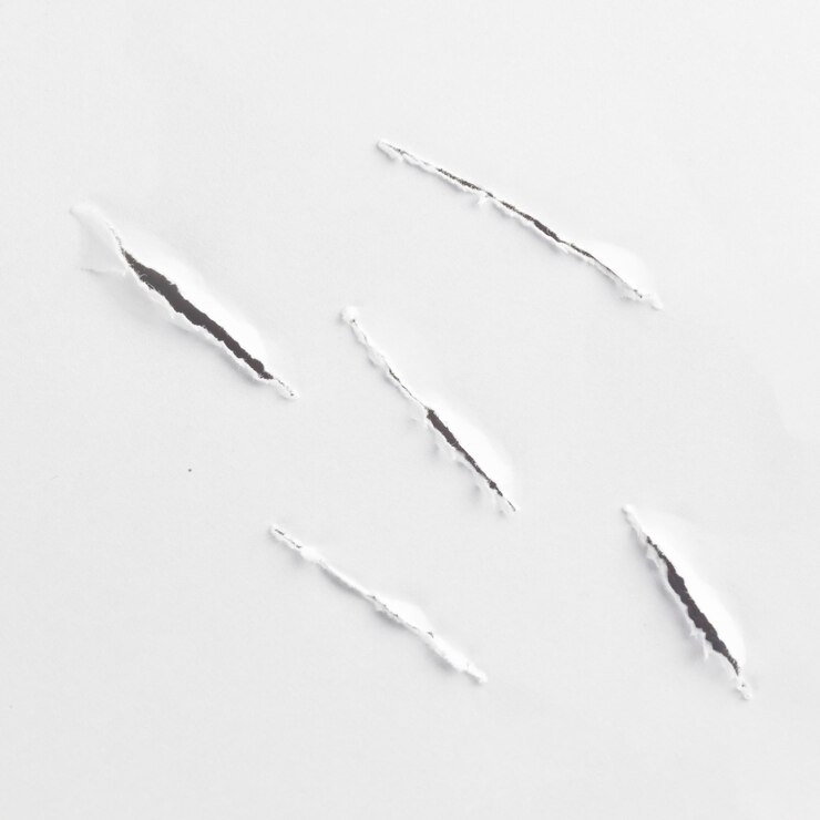 Foto ein weißes papier mit dem buchstaben v darauf