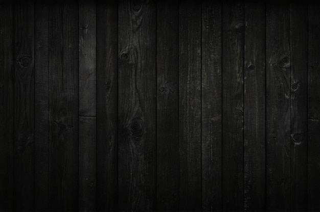 eine dunkle Holzwand mit einem Hintergrund aus einer Holzplatte, auf der steht freie Quote
