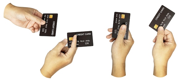 Eine festgelegte Gruppe männlicher Hände hält eine Kreditkarte, die auf Weiß isoliert ist