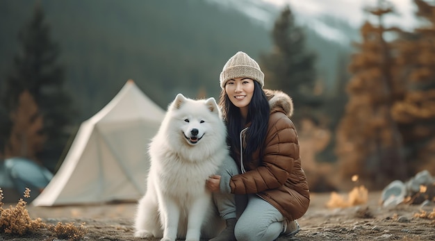 Eine Frau mit Hund mit Naturhintergrund