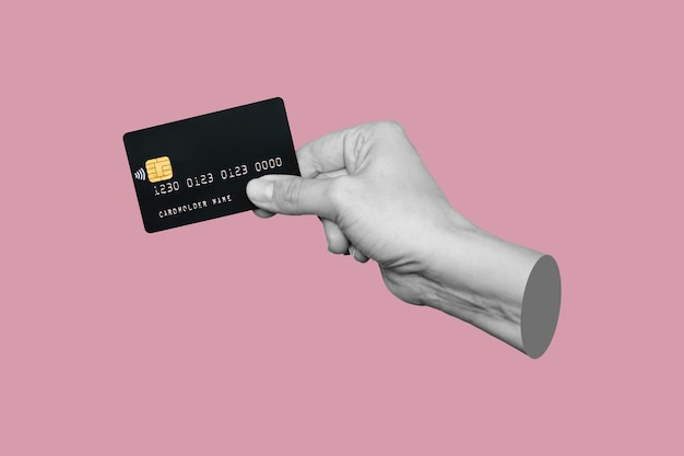 Foto eine hand, die eine schwarze plastikkreditkarte mit leerzeichen für text hält trendige zeitgenössische kunst 3d