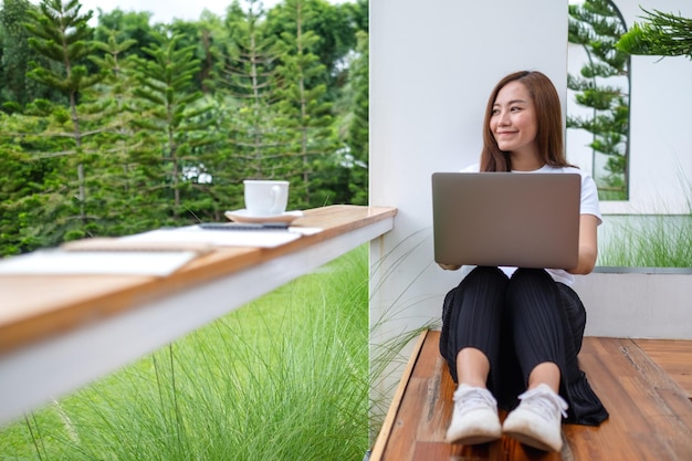 Eine junge asiatische Frau, die im Freien einen Laptop verwendet und daran arbeitet