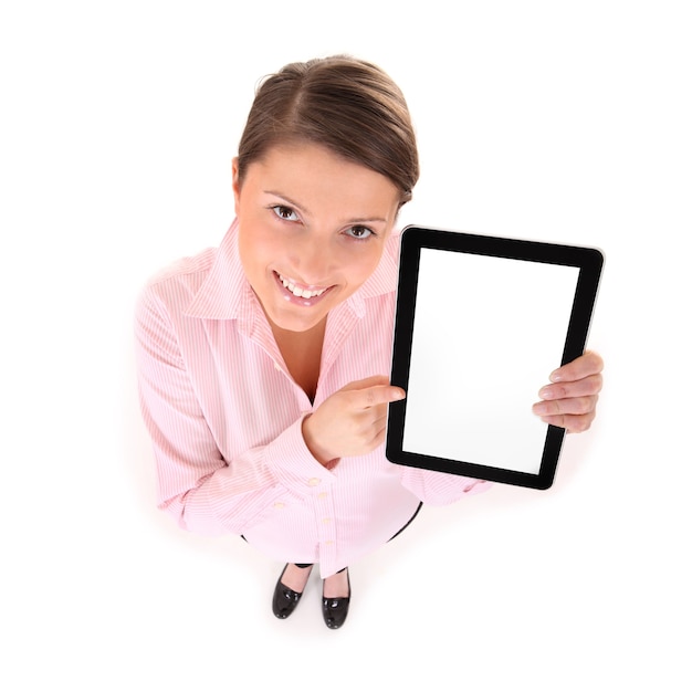 eine junge Frau mit einem Tablet-Computer über Weiß