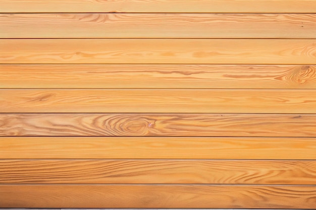 Eine Nahaufnahme einer Holzplatte mit sichtbarem Holzkorn