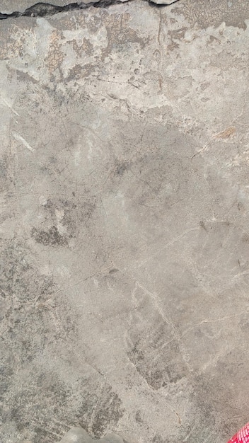 Eine Nahaufnahme eines weißen Marmorbodens mit einem grauen und braunen Marmorboden.
