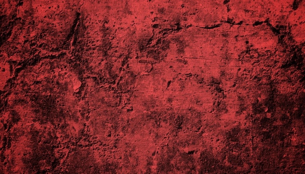 Eine rote Wand mit einem schwarz-weißen Muster.