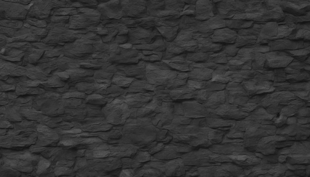 Eine Wand aus schwarzem Stein mit einer rauen Textur.
