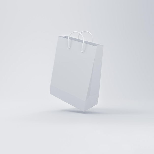 Einkaufstasche, die auf minimalem weißem Hintergrund schwebt