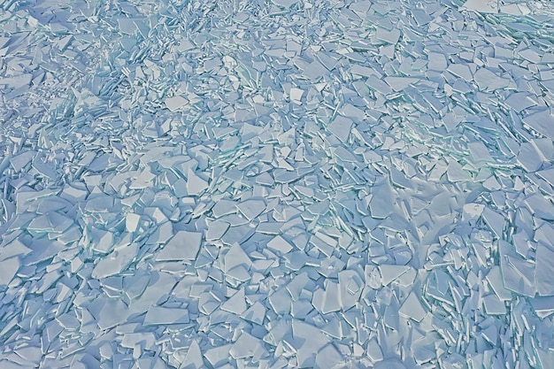 Eishügel Baikal Draufsicht Textur, abstrakter Hintergrund Winter gebrochenes Eis