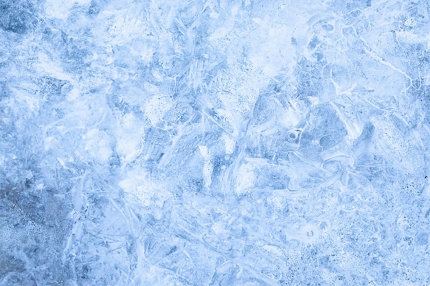 Eisiger Winter-Hintergrund mit gebrochener Grunge-Textur auf der Eislaufbahn