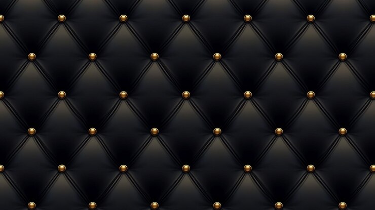 La elegante pared de tejas negras con pernos dorados mejora el atractivo del diseño interior