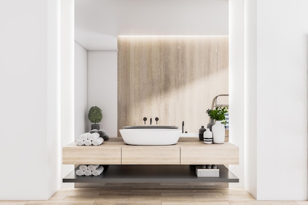 Elegante y soleado baño de diseño ecológico con paredes de madera y encimera, lavabo blanco, toallas enrolladas y paredes claras y limpias