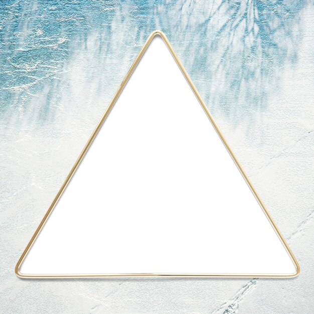 Elemento de diseño del marco de oro triangular sobre un fondo gris
