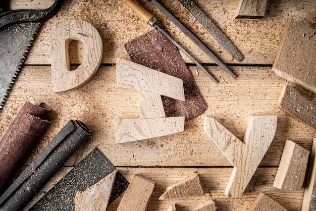 Foto elementos de produção de madeira com arranjo de palavras diy