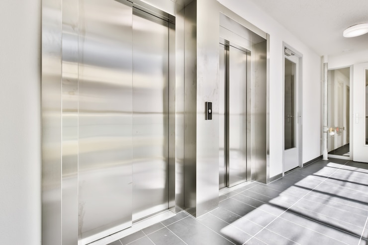 Foto elevador de metal con estilo en un acogedor edificio de gran altura