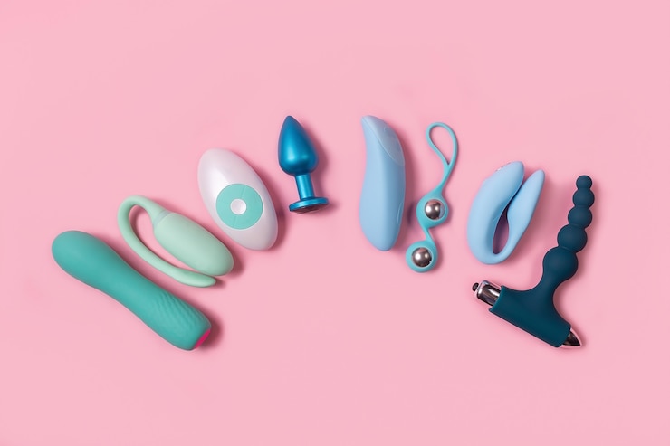 Foto em um produto sexual de parede rosa, um brinquedo para adultos