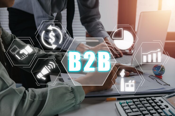 Foto empresa de negocios b2b comercio tecnología concepto de marketing empresario maduro que utiliza una tableta digital para discutir información con un colega más joven con icono b2b en pantalla virtual