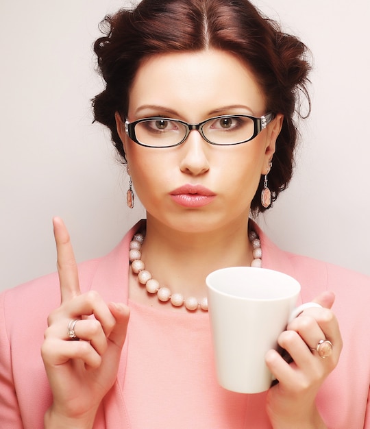 empresária, tendo uma pausa para café