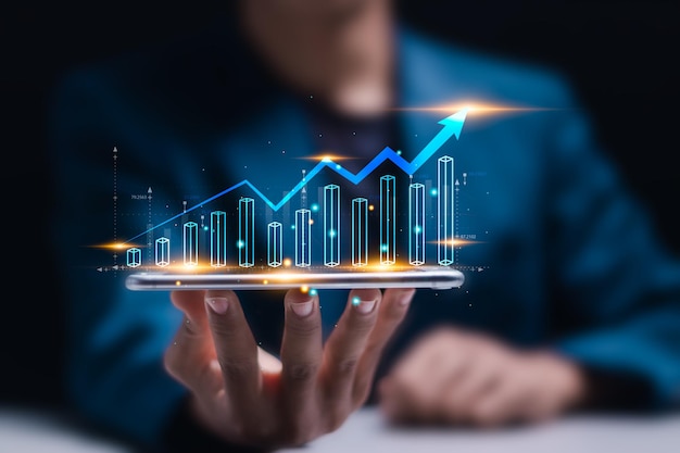 Empresario analizando ganancias financieras y gráfico de crecimiento económico gráfico para planificación y estrategia de negocios gráfico de concepto de crecimiento de negocios y tecnología blockchain Análisis de datos