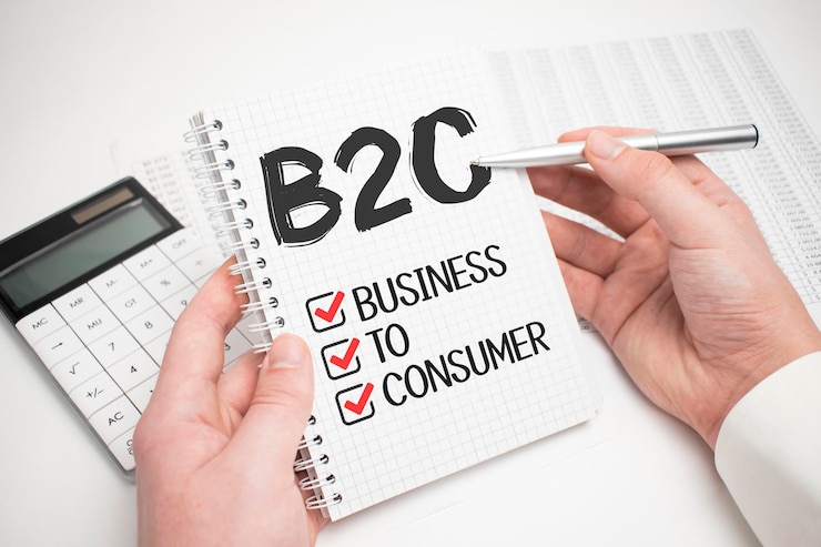 Empresario escribiendo conceptos B2C en su nota