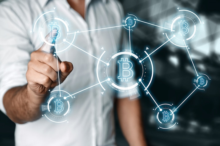 Foto el empresario interactúa con la red de tecnología bitcoin. técnica mixta
