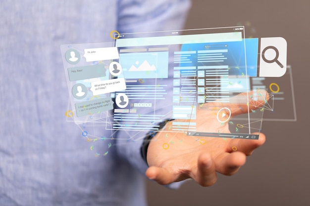 Empresario mano en fondo borroso utilizando medios de representación 3D desarrollar interfaz aplicación web